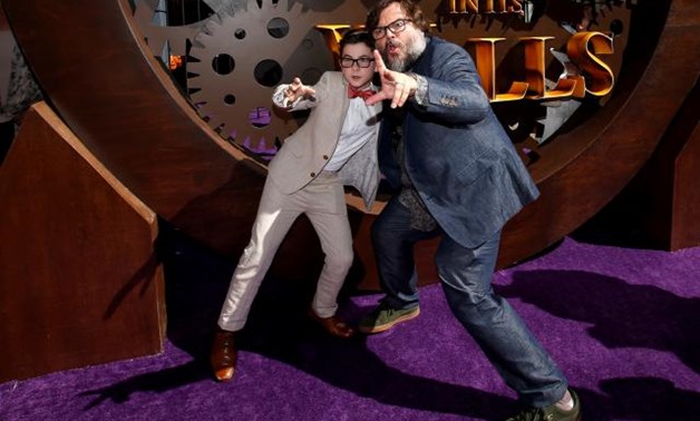 Actors Jack Black and Owen Vaccaro pose at the premiere for "The House With a Clock in its Walls" in Los Angeles, California, U.S., August 16, 2018. REUTERS/Mario Anzuoni.