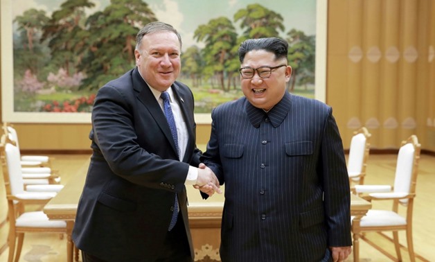 US Secretary of State Mike Pompeo, left, is preparing his fourth trip to North Korea, where he will meet leader Kim Jong Un
