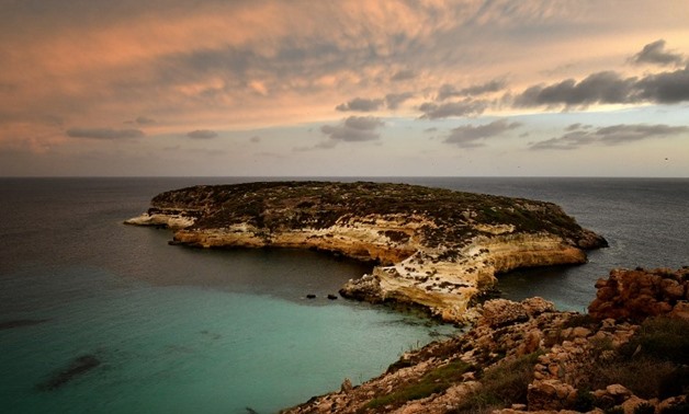 Lampedusa's famous beaches emptied as the island became a hub for migrant crossings. Photo: Alberto Pizzoli/AFP