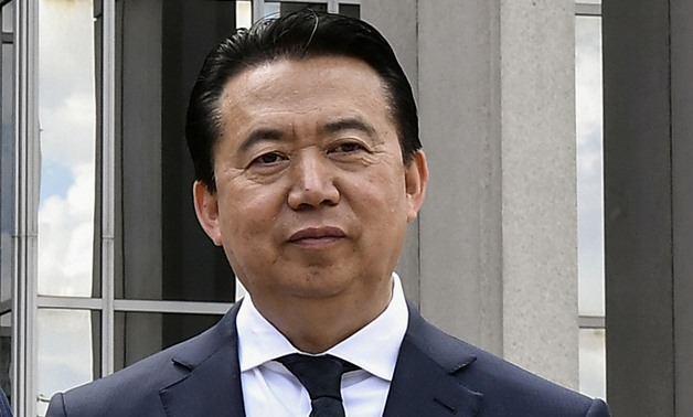 INTERPOL President Meng Hongwei poses during a visit to the headquarters of International Police Organisation in Lyon, France, May 8, 2018. Picture taken May 8, 2018. Jeff Pachoud/Pool via Reuters