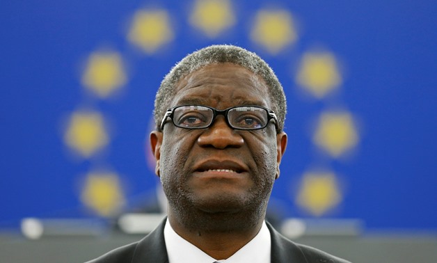 Congolese gynaecologist Denis Mukwege delivers a speech during an award ceremony to receive his 2014 Sakharov Prize at the European Parliament in Strasbourg November 26, 2014. Mukwege is specialized in the treatment of rape victims and founder of the Panz