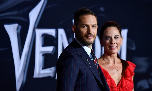 Venom, which stars Tom Hardy (L), was met harshly by critics, but had a record opening weekend GETTY IMAGES NORTH AMERICA AFP File  Frazer Harrison