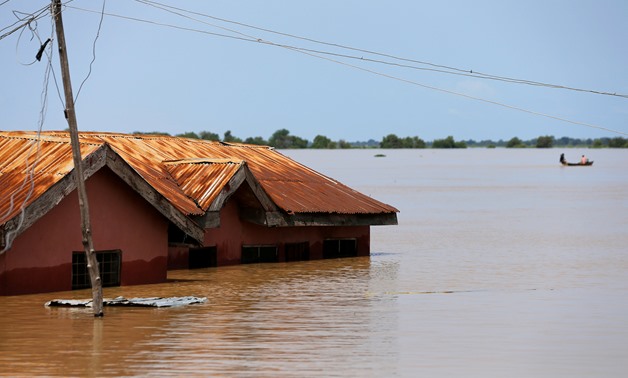 FILE PHOTO: A house partially submerged in flood waters is pictured in Lokoja city, Kogi State, Nigeria September 17, 2018. REUTERS/Afolabi Sotunde/File Photo
