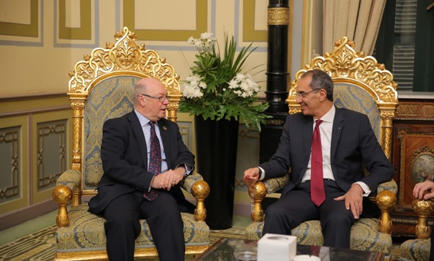 Minister of Telecommunication and Communication Technology Amr Talaat (l) and British Minister of State for the Middle East at the Foreign and Commonwealth Office Alistair Burt (r) - Press Photo 