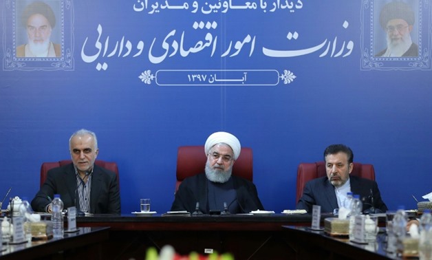 Iran's President Hassan Rouhani (C), seen at a cabinet meeting in Tehran in a handout picture provided by the Iranian presidency on November 5, 2018, said the Islamic republic "will proudly bypass sanctions" by the United States
