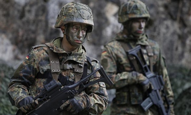 German Bundeswehr army soldiers demonstrate their skills at Kaserne Hochstaufen (mountain infantry military barracks) in Bad Reichenhall, southern Germany, March 23, 2016. REUTERS/Michaela Rehle
