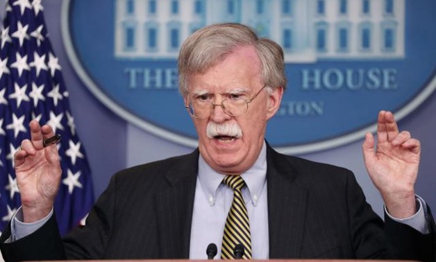 FILE PHOTO: U.S. National Security Adviser John Bolton answers a question from a reporter about how he refers to Palestine during a news conference in the White House briefing room in Washington, U.S., October 3, 2018. REUTERS/Jonathan Ernst/File Photo