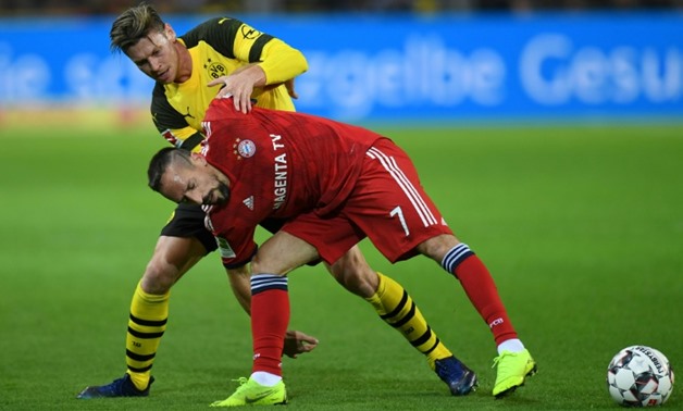 Franck Ribery allegedly slapped television pundit Patrick Guillou following Bayern Munich's 3-2 defeat to Borussia Dortmund on Saturday.
AFP / Christof STACHE

