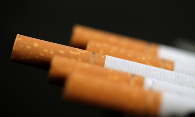 FILE PHOTO: An illustration picture shows cigarettes in their pack, October 8, 2014. REUTERS/Christian Hartmann/Illustration