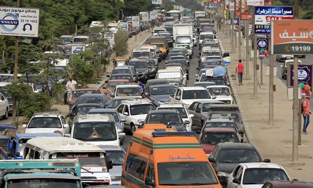 Motorists stuck in a traffic jam on the outskirts of Cairo. REUTERS/Amr Abdallah Dalsh