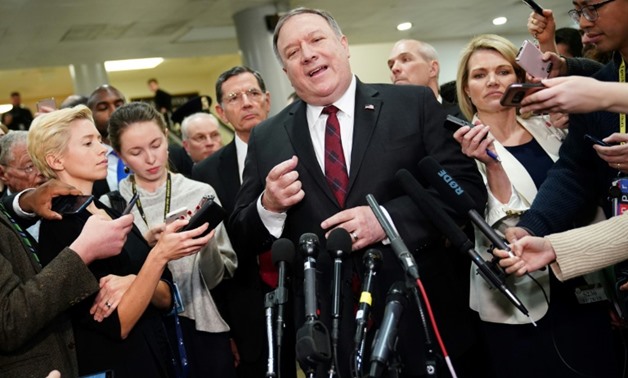US Secretary of State Mike Pompeo speaks to reporters at the US Capitol after briefing senators in Washington, DC on November 28, 2018
