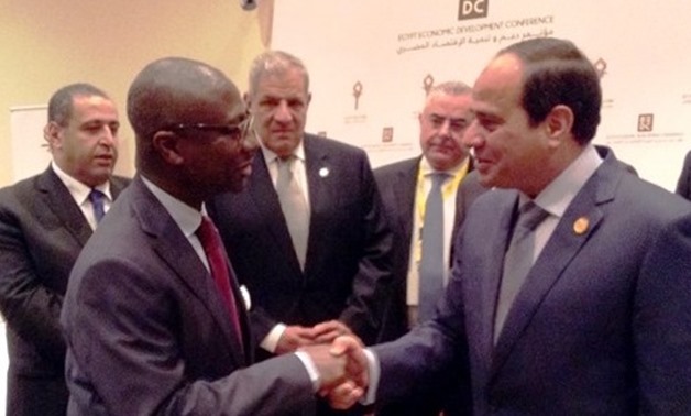 Afreximbank President Jean-Louis Ekra (left) presenting the Bank to Egyptian President Abdel - Courtesy of Afreximbank website