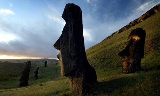 FILE PHOTO: A view of "Moai" statues in Rano Raraku volcano, on Easter Island, 4,000 km (2486 miles) west of Santiago, in this photo taken Oct. 31, 2003. REUTERS/Carlos Barria//File Photo