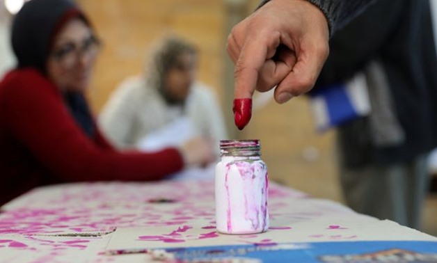 A voter's finger is marked with ink at a polling station during the second day of the presidential election in Alexandria, Egypt March 27, 2018. REUTERS/Mohamed Abd El Ghany