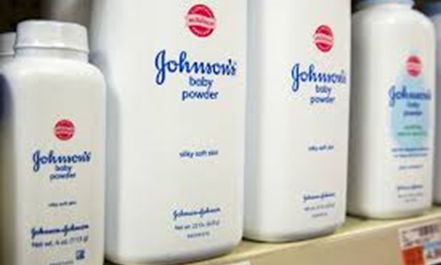 FILE PHOTO: Bottles of Johnson & Johnson baby powder line a drugstore shelf in New York October 15, 2015. REUTERS/Lucas Jackson/File Photo
