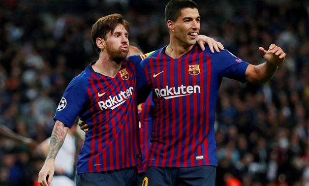 :FILE PHOTO: Soccer Football - Champions League - Group Stage - Group B - Tottenham Hotspur v FC Barcelona - Wembley Stadium, London, Britain - October 3, 2018 Barcelona's Lionel Messi celebrates with Luis Suarez after scoring their fourth goal Action Ima