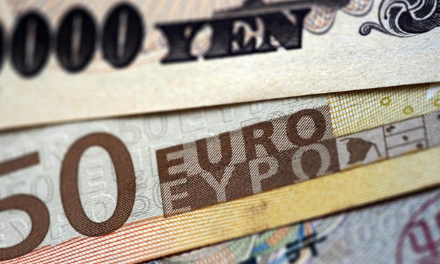 FILE: The euro rose 0.2 percent and last fetched $1.1398