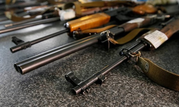 FILE - Confiscated weapons are seen at a police station in Slovyansk, in Ukraine's Donetsk region - REUTERS