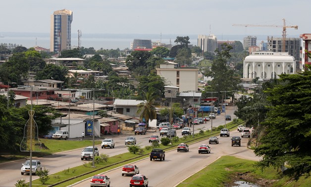 FILE PHOTO: Cars drive down a highway beneath the skyline of Libreville, Gabon's capital, January 16, 2017. REUTERS/Mike Hutchings/File Photo
