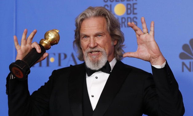 76th Golden Globe Awards - Photo Room - Beverly Hills, California, U.S., January 6, 2019 Jeff Bridges poses backstage with his Cecil B. Demille award. REUTERS/Mario Anzuoni
