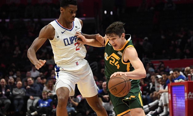 Jan 16, 2019; Los Angeles, CA, USA; Utah Jazz guard Grayson Allen (24) is defended by LA Clippers guard Shai Gilgeous-Alexander (2) in the second half at Staples Center. The Jazz defeated the Clippers 129-109. Mandatory Credit: Kirby Lee-USA TODAY Sports