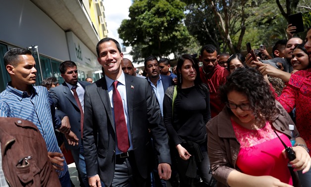 Venezuelan opposition leader Juan Guaido leaves after a meeting with representatives of FEDEAGRO, the Confederation of Associations of Agricultural Producers of Venezuela, in Caracas, Venezuela February 6, 2019. REUTERS/Carlos Garcia Rawlins
