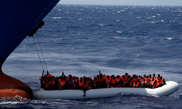 FILE - Migrants rescued in the Mediterranean - Reuters