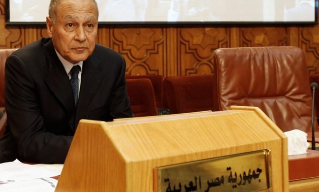 Ahmed Aboul Gheit sits beside an unoccupied seat for the Libyan foreign minister, at the opening of an emergency meeting among the Arab League foreign ministers, held to discuss issues about Libya, at the headquarters in Cairo March 2, 2011. REUTERS/Amr A
