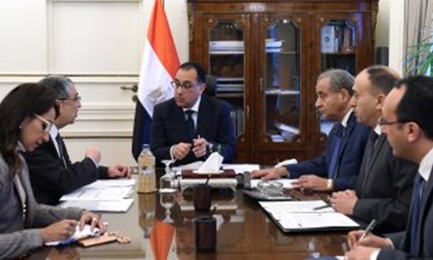 Prime Minister Mostafa Madbouly, Minister of Electricity and Renewable Energy Mohamed Shaker (l), and Minister of Supply and Internal Trade Ali al-Meselhy in a meeting at the Cabinet’s headquarters in Cairo, Egypt. February 19, 2019. Press Photo 