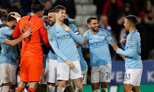 Soccer Football - Carabao Cup Quarter-Final - Leicester City v Manchester City - King Power Stadium, Leicester, Britain - December 18, 2018 Manchester City's John Stones and team mates celebrate after the match REUTERS/Darren Staples
