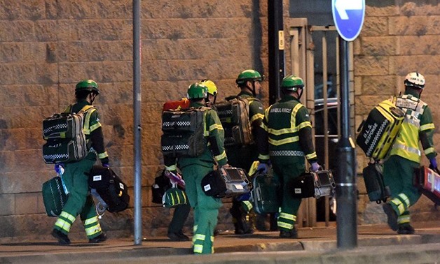 Medics arrive at the scene of the suspected explosion at an Ariana Grande pop concert in Manchester, Britain (AFP Photo/Paul ELLIS)