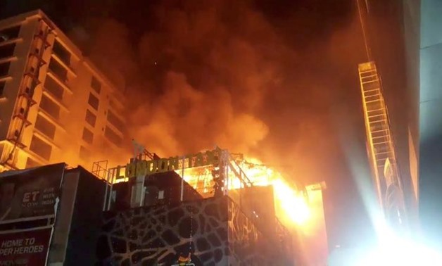 FILE - Fire rages at a multi-storey building in Mumbai, India, in this still image taken from a social media video, on December 29, 2017. Poonam Burde/via REUTERS