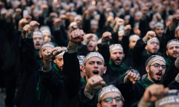 FILE PHOTO: Lebanon's Hezbollah supporters chant slogans during last day of Ashura, in Beirut, Lebanon September 20, 2018. REUTERS/Aziz Taher