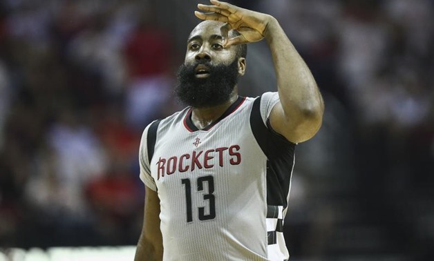 May 7, 2017; Houston, TX, USA; Houston Rockets guard James Harden (13) celebrates after making a three point basket during the third quarter against the San Antonio Spurs in game four of the second round of the 2017 NBA Playoffs at Toyota Center. Mandator