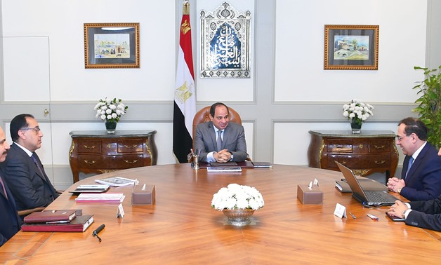 President Abdel Fahat al-Sisi meets with Prime Minster Moustafa Madbouli and Minister of Petroleum Tarek el Molla on March 7, 2019 - Press photo