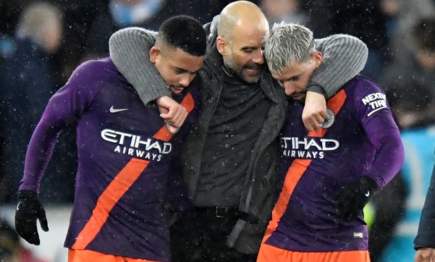 Soccer Football - FA Cup Quarter Final - Swansea City v Manchester City - Liberty Stadium, Swansea, Britain - March 16, 2019 Manchester City's Sergio Aguero and Gabriel Jesus celebrate with manager Pep Guardiola after the match REUTERS/Toby Melville
