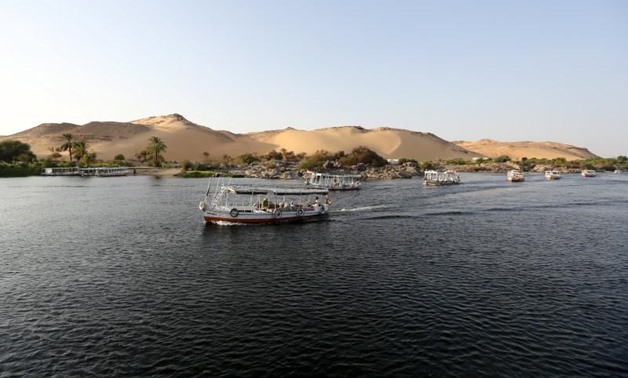 Boats sail in the Nile River in Aswan on the road to the touristic Nubia, south of Egypt, October 1, 2015. REUTERS/ Mohamed Abd El Ghany 