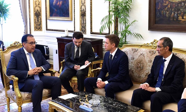 Prime Minister Mostafa Madbouly (l), Russian Minister of Digital Development, Communications and Mass Media Kostantin Noskov, and Minister of Communications and Information Technology Amr Talaat (r) in the Cabinet’s headquarters in Cairo, Egypt. March 19,