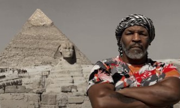 FILE - Tyson before Pyramids of Giza