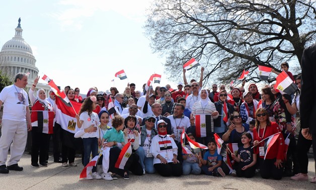 A number of the Egyptian expatriates in the U.S. gathered in front of the Congress holding flags. April 8, 2019. 