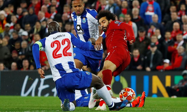 Soccer Football - Champions League Quarter Final First Leg - Liverpool v FC Porto - Anfield, Liverpool, Britain - April 9, 2019 Liverpool's Mohamed Salah in action with FC Porto's Danilo Pereira REUTERS/Phil Noble 