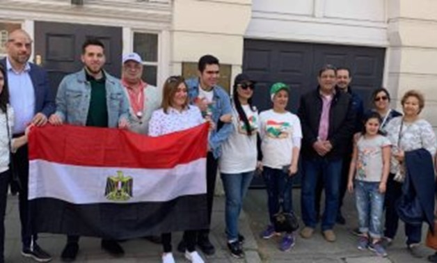 Voters in referendum on draft constitutional amendments standing in front of Egypt’s embassy in Tunis, Tunisia. April 19, 2019. Press Photo