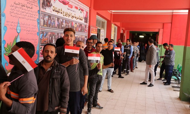 Youth standing in a queue at a polling place in Egypt. April 21, 2019. Egypt Today/Hossam Atef 