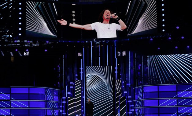 2017 Billboard Music Awards – Show - Las Vegas, Nevada, U.S., 21/05/2017 - Dan Reynolds of Imagine Dragons speaks in tribute to the late Chris Cornell (shown on screen). REUTERS/Mario Anzuoni
