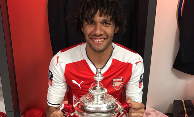 Mohamed el-Nenny carrying the English FA Cup - Photo courtesy of CAF Twitter account