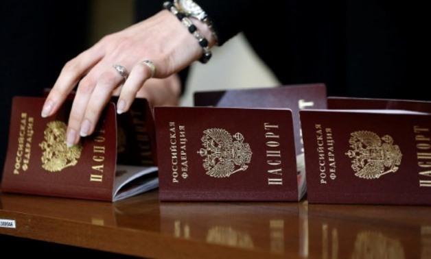 Crimean residents can obtain Russian passports without much difficulty AFP
