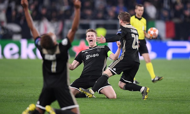 Allianz Stadium, Turin, Italy - April 16, 2019 Ajax's Matthijs de Ligt and Lasse Schone celebrate after the match REUTERS/Alberto Lingria