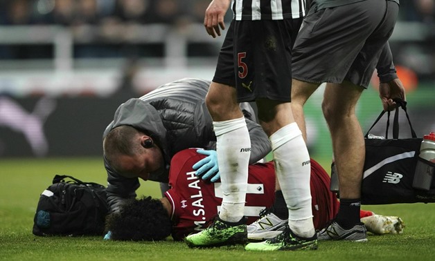 Salah left the game against Newcastle on a stretcher, Reuters 