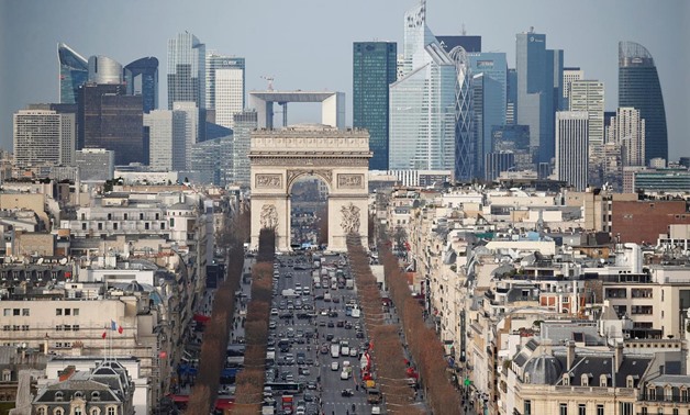 FILE PHOTO: General view of the skyline of La Defense business district with its Arche behind Paris' landmark, the Arc de Triomphe and the Champs Elysees Avenue in Paris, France, January 13, 2016. REUTERS/Charles Platiau/File Photo