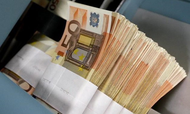 FILE PHOTO: Fifty-euro notes are seen at the Belgian Central Bank in Brussels in this December 8, 2011 file photo. REUTERS/Yves Herman
